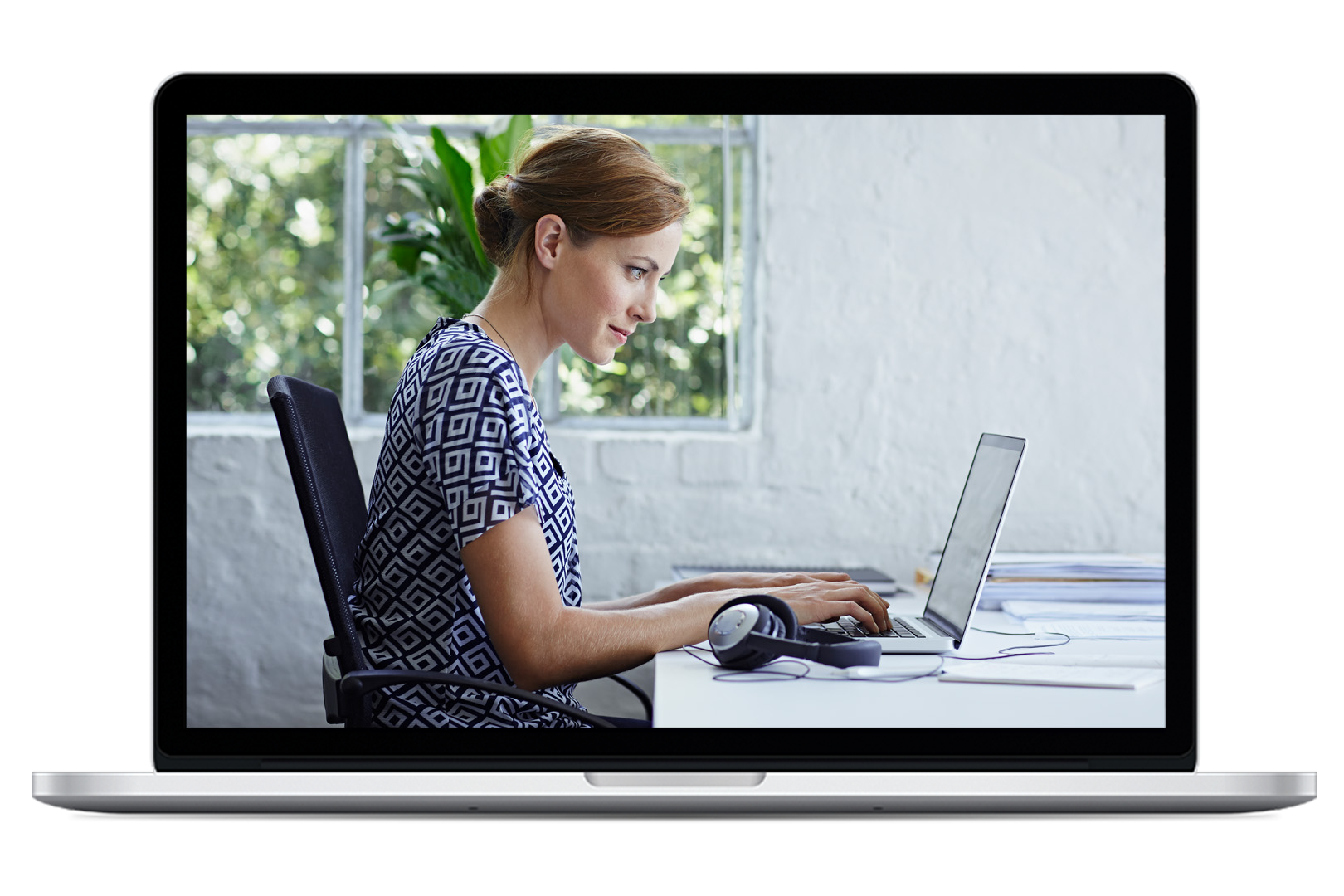 Laptop displaying a woman working on a laptop